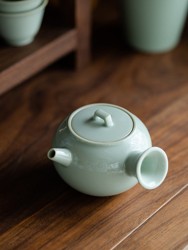 This is a ceramic teapot