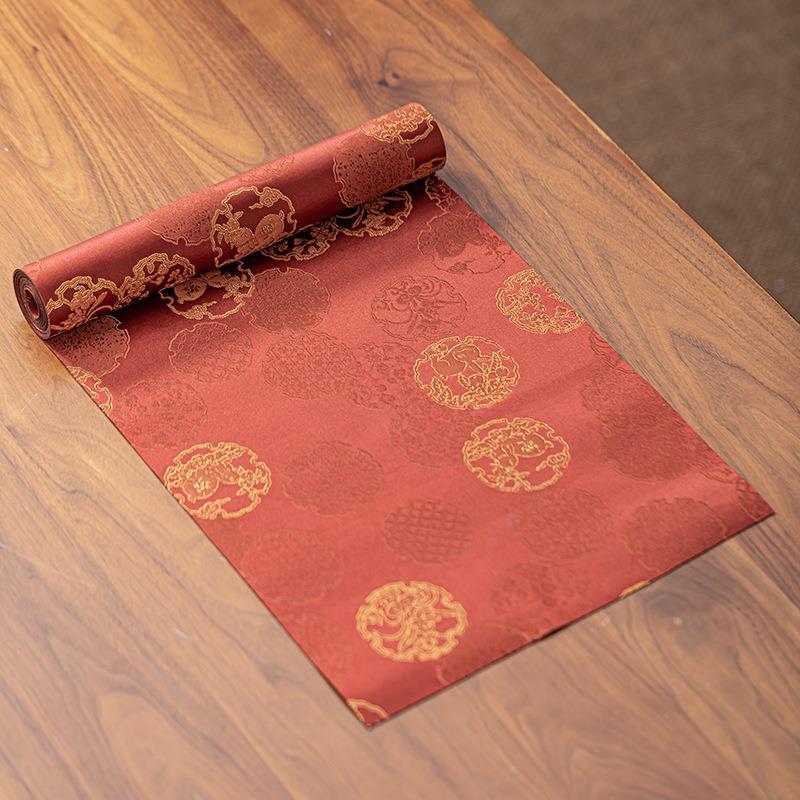 This is a silk brocade tea mat.this is a waterproof table cloth