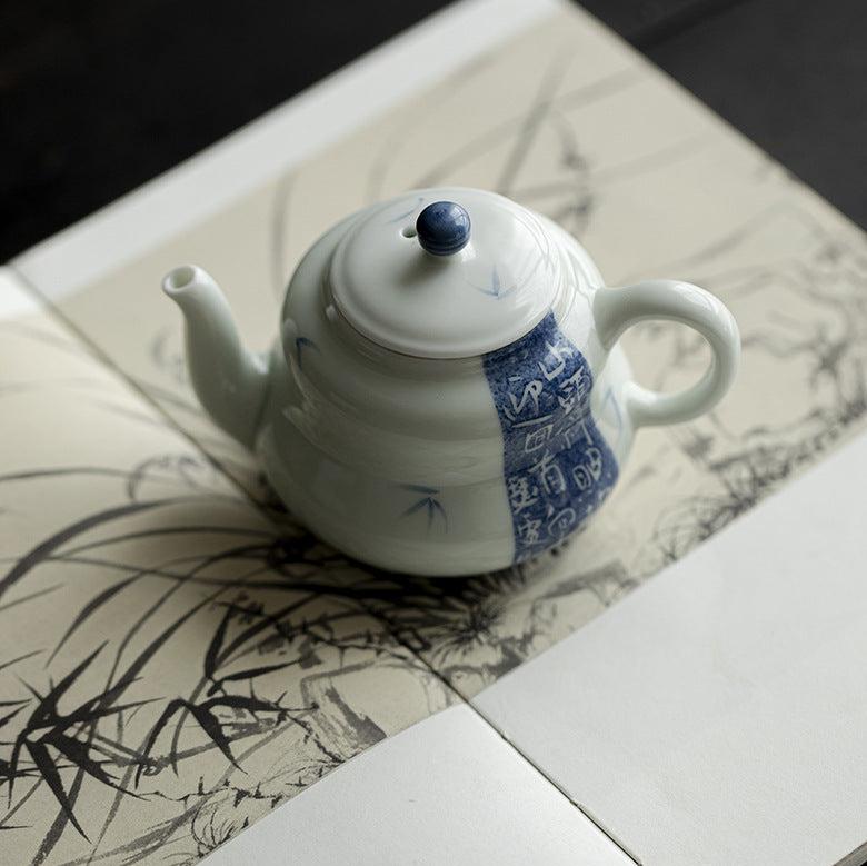 This is a ceramic teapot