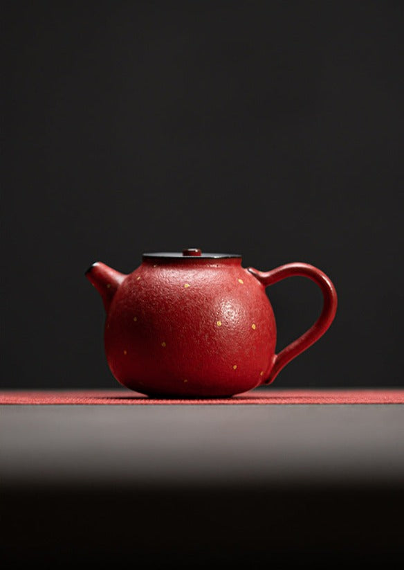 this is a ceramic teapot