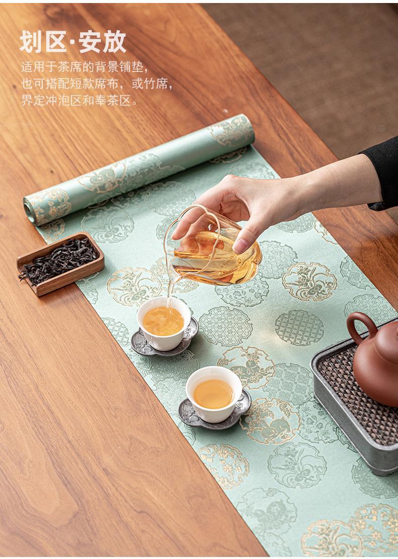 This is a silk brocade tea mat.this is a waterproof table cloth