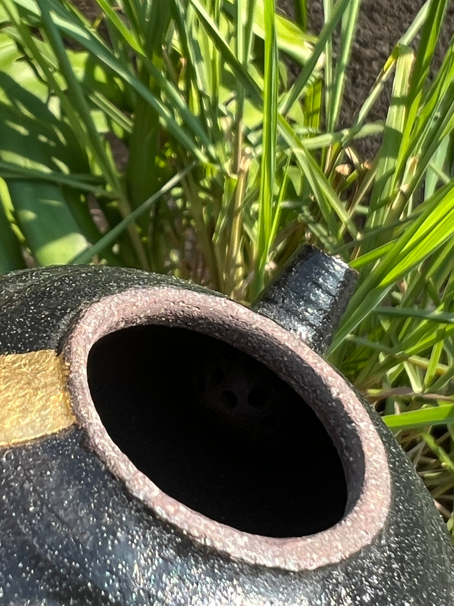 this is Chinese lacquer ware. this is a pottery teapot