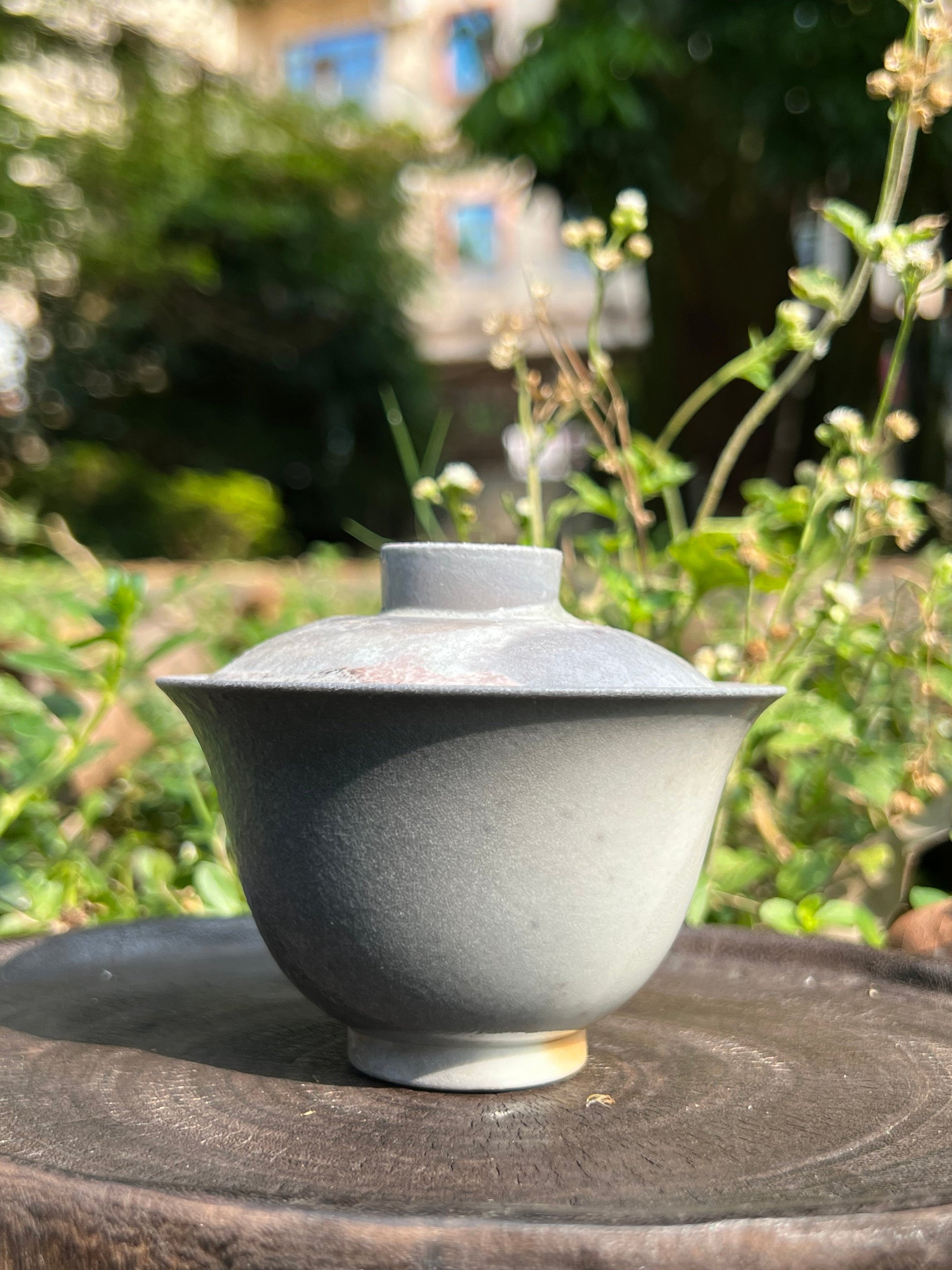 This is a woodfired pottery teapot gaiwan