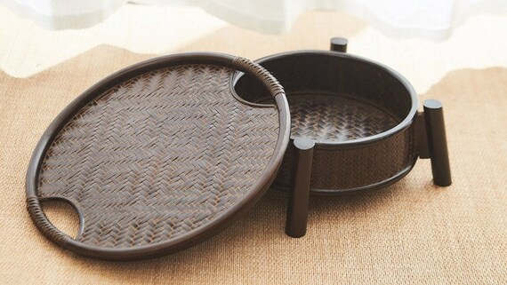 This is a bamboo weaving storage tea table.this is a black tea table 