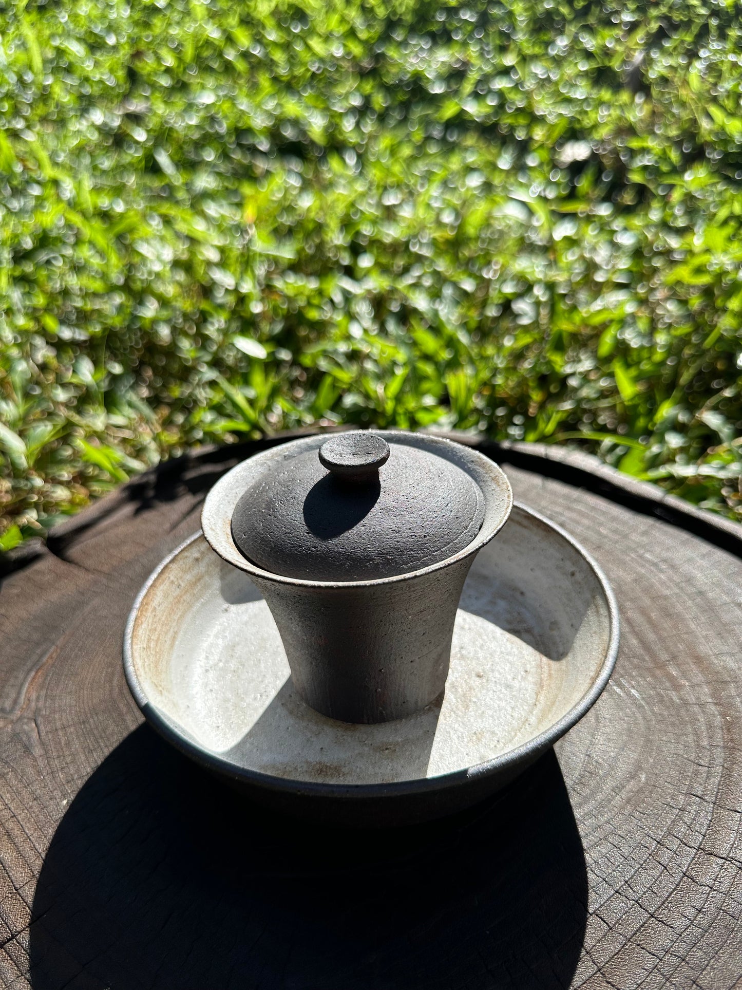 this is a pottery teapot gaiwan