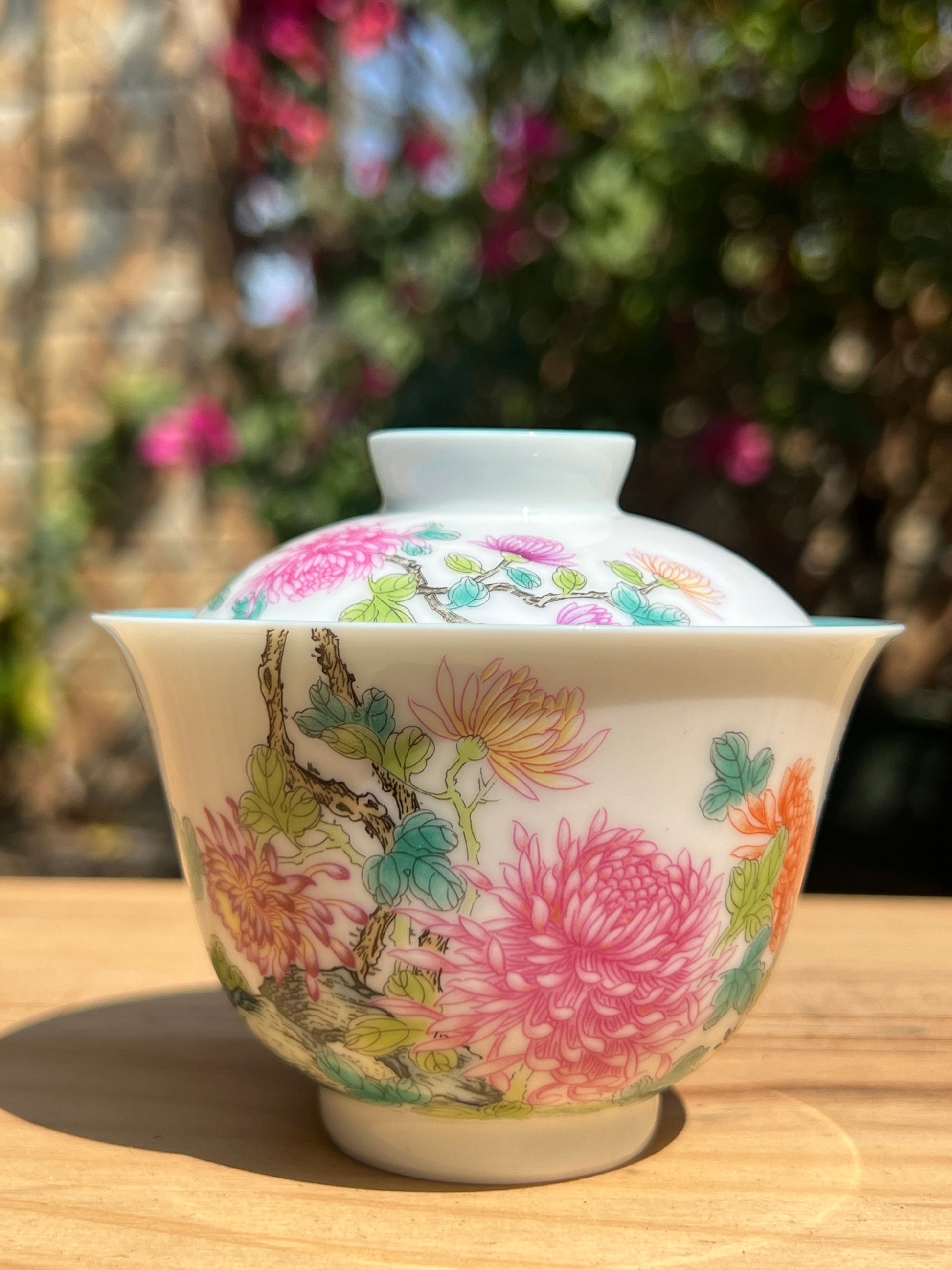 This is a Chinese Jingdezhen enamel chrysanthemum flower teapot gaiwan