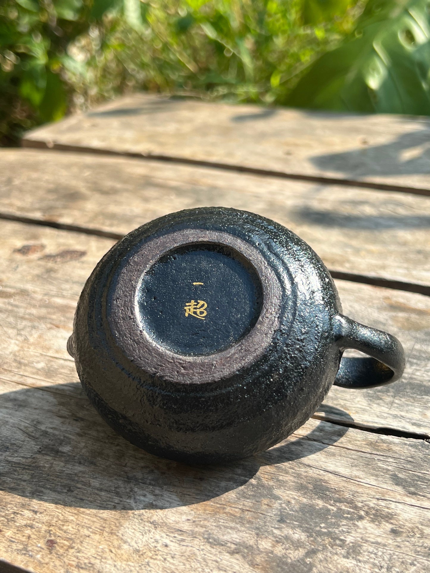 this is Chinese lacquer ware. this is a pottery teapot