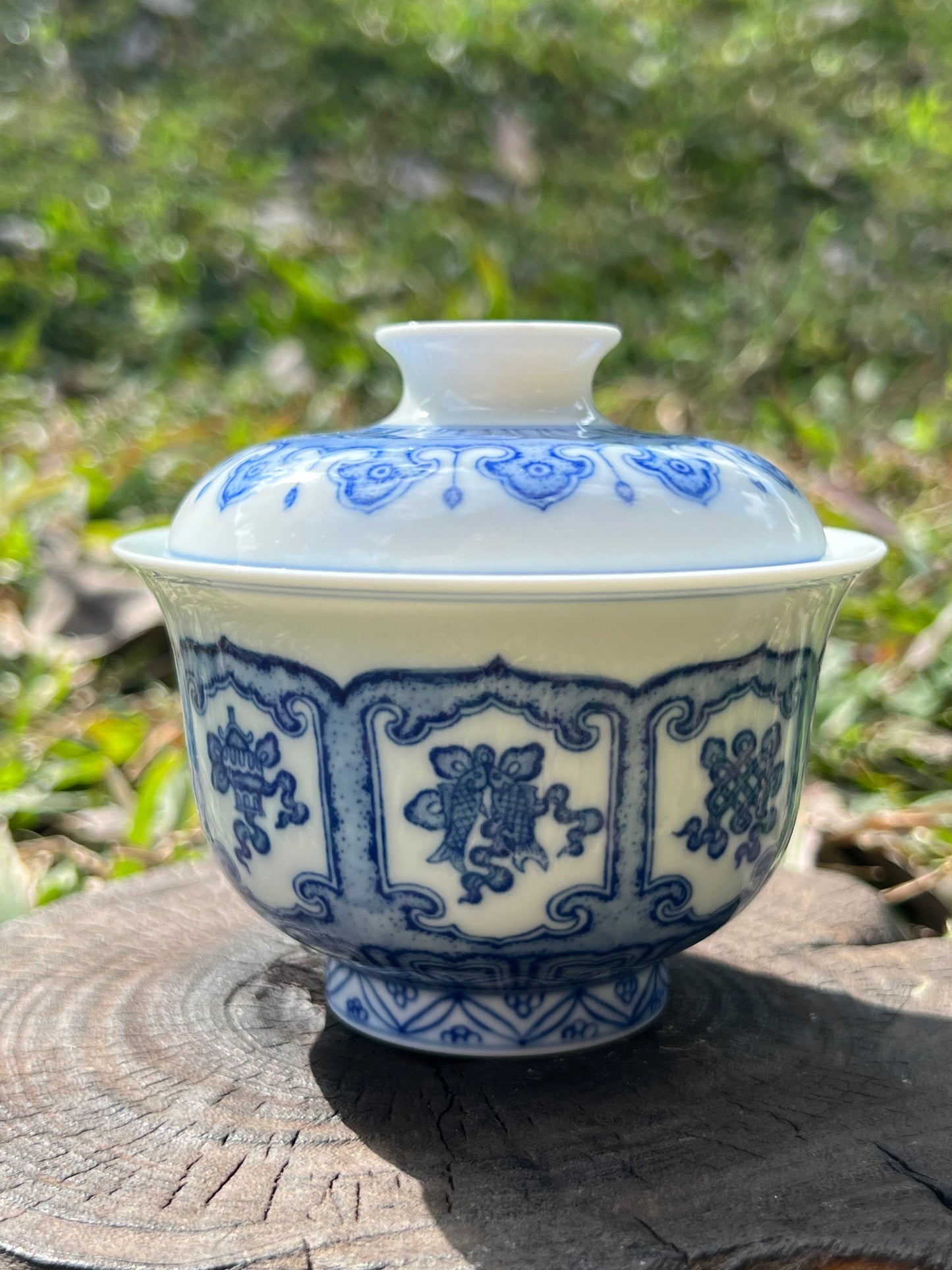 This is a Chinese Jingdezhen blue and white porcelain baoxiang flower teapot gaiwan