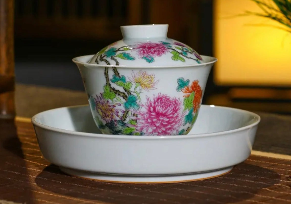 This is a Chinese Jingdezhen enamel chrysanthemum flower teapot gaiwan