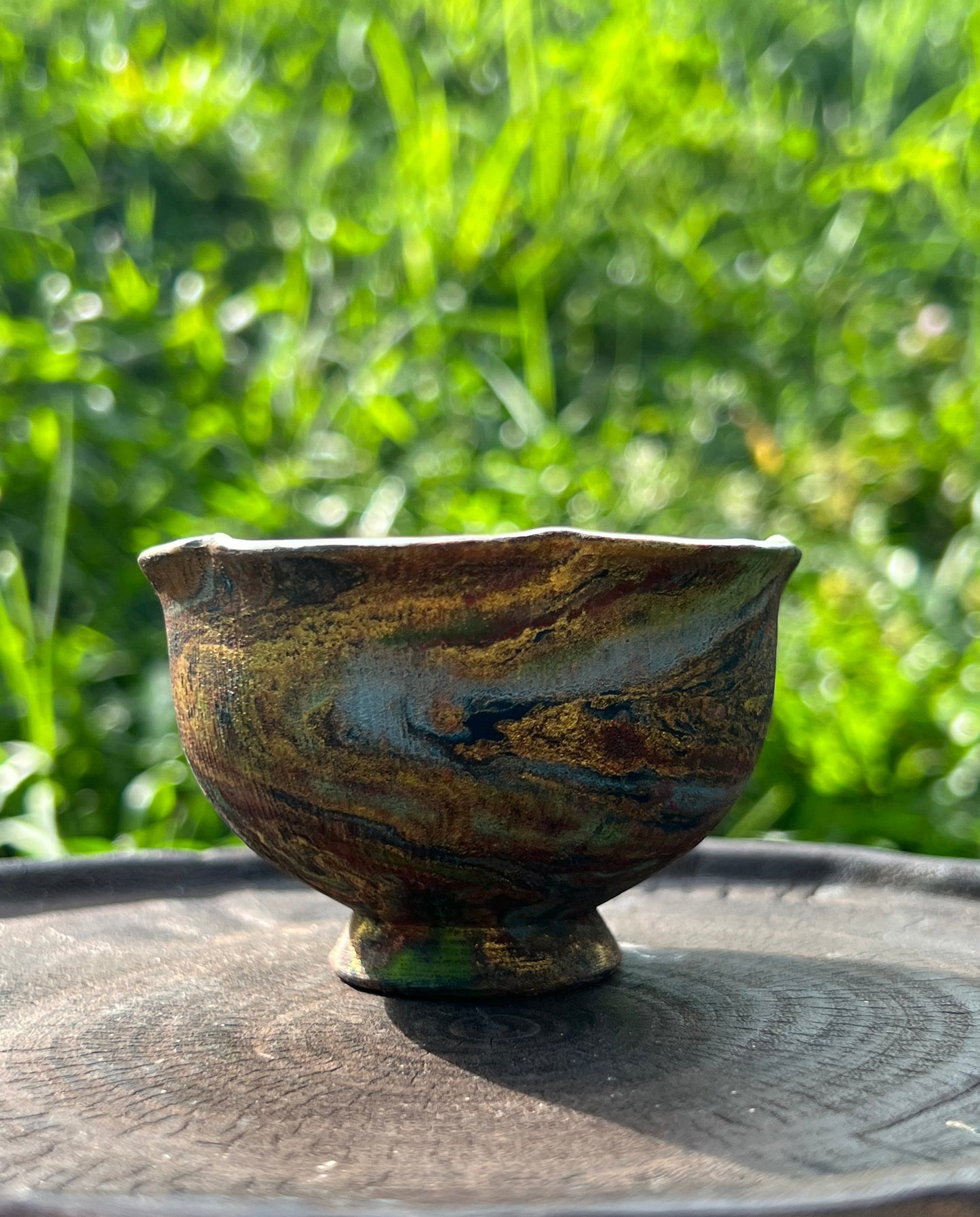 this is Chinese lacquer ware teacup. this is a pottery teacup