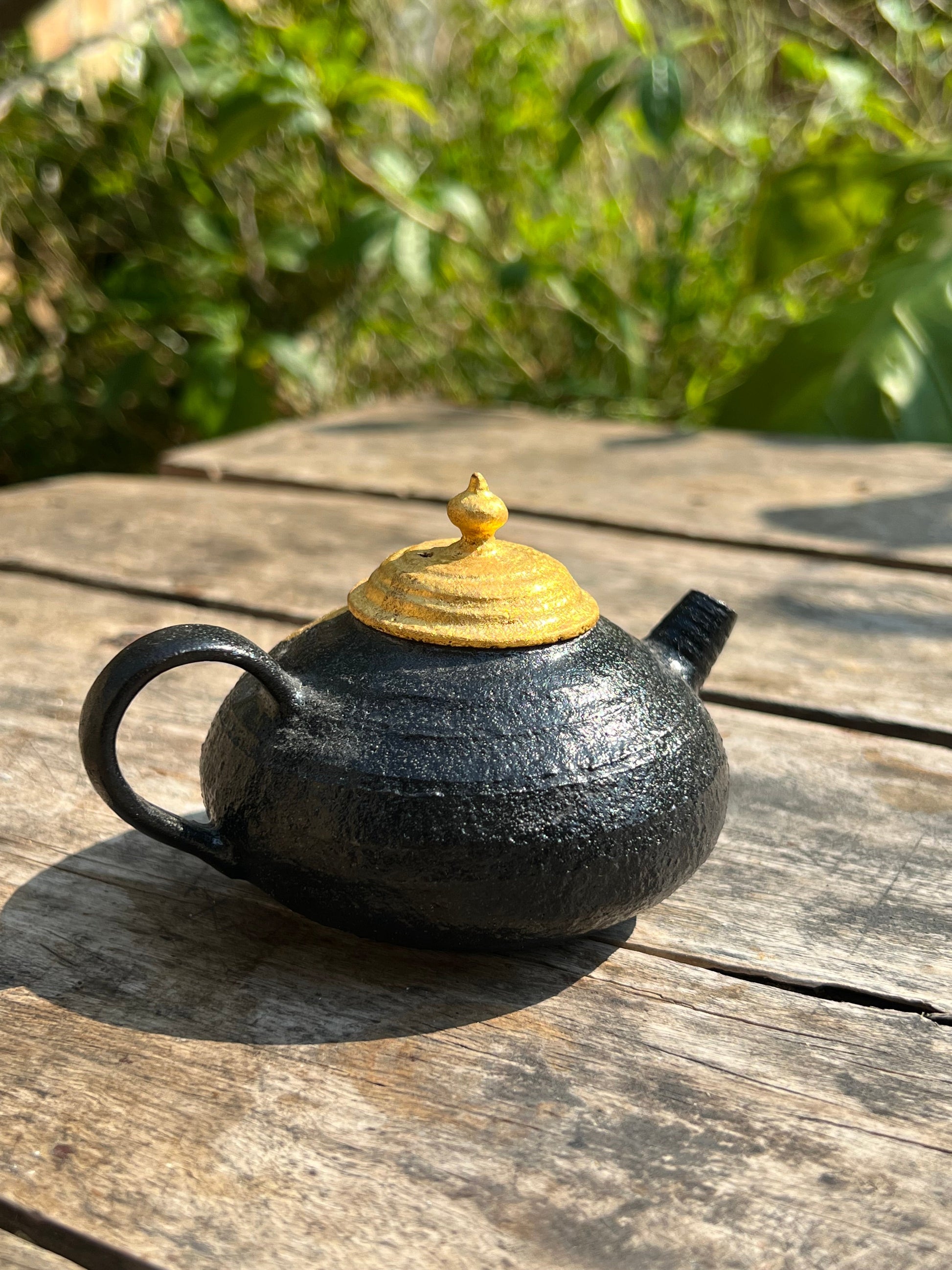 this is Chinese lacquer ware. this is a pottery teapot