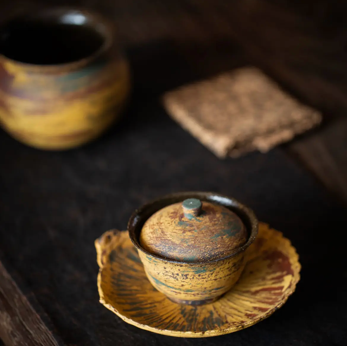 this is a pottery gaiwan.