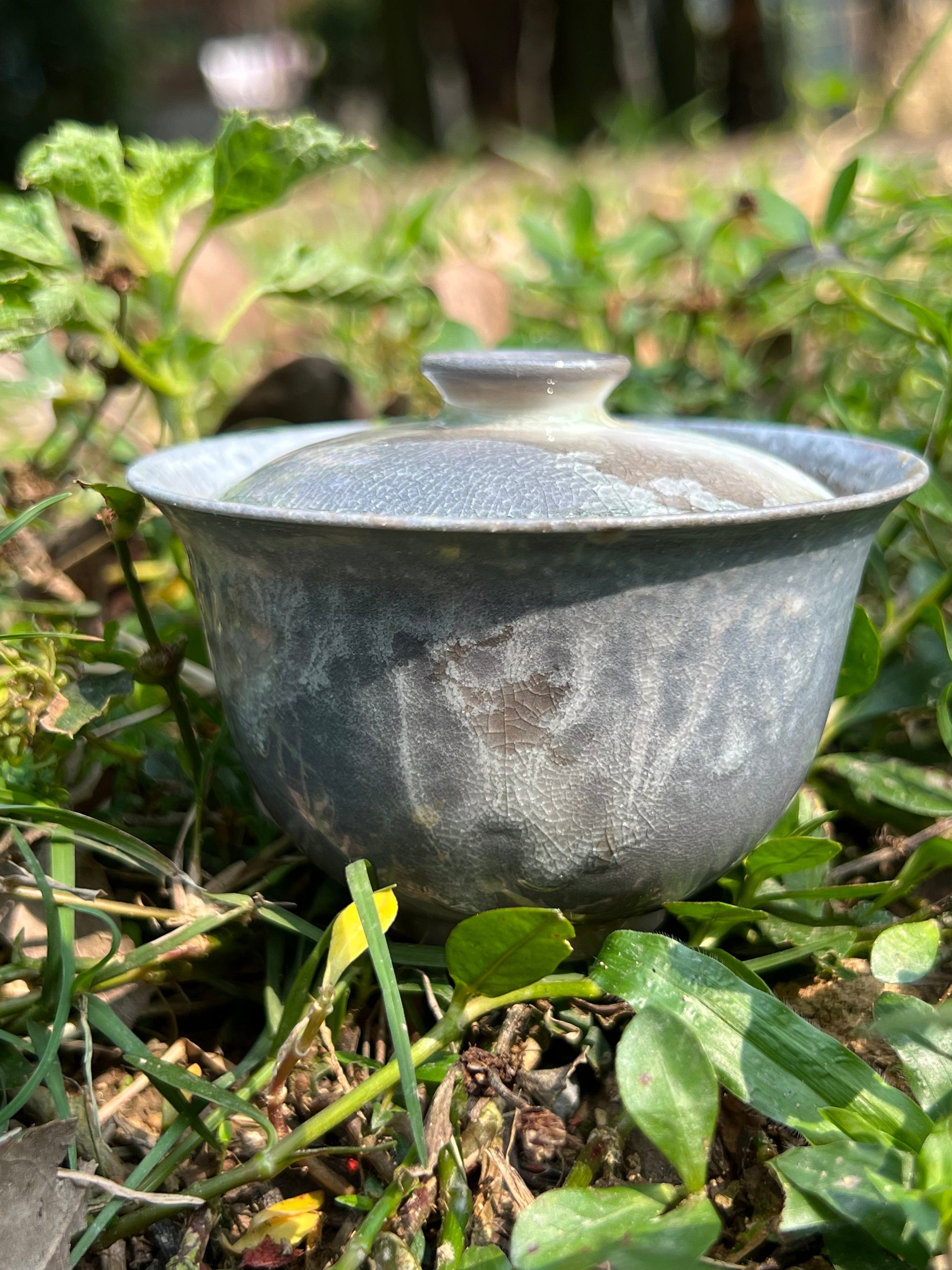 This is a woodfired pottery teapot gaiwan