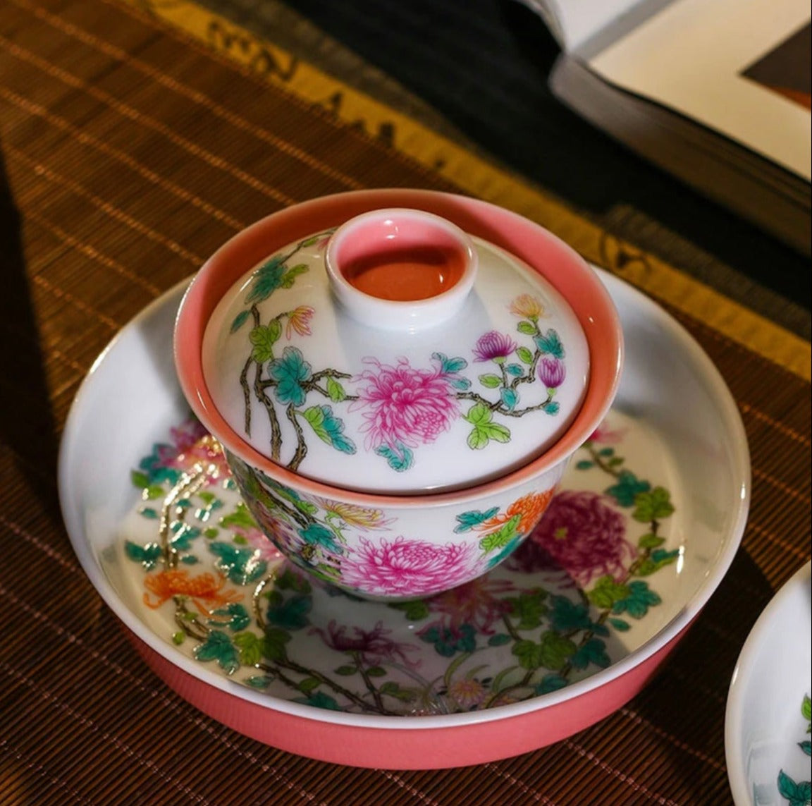 This is a Chinese Jingdezhen enamel chrysanthemum flower teapot gaiwan