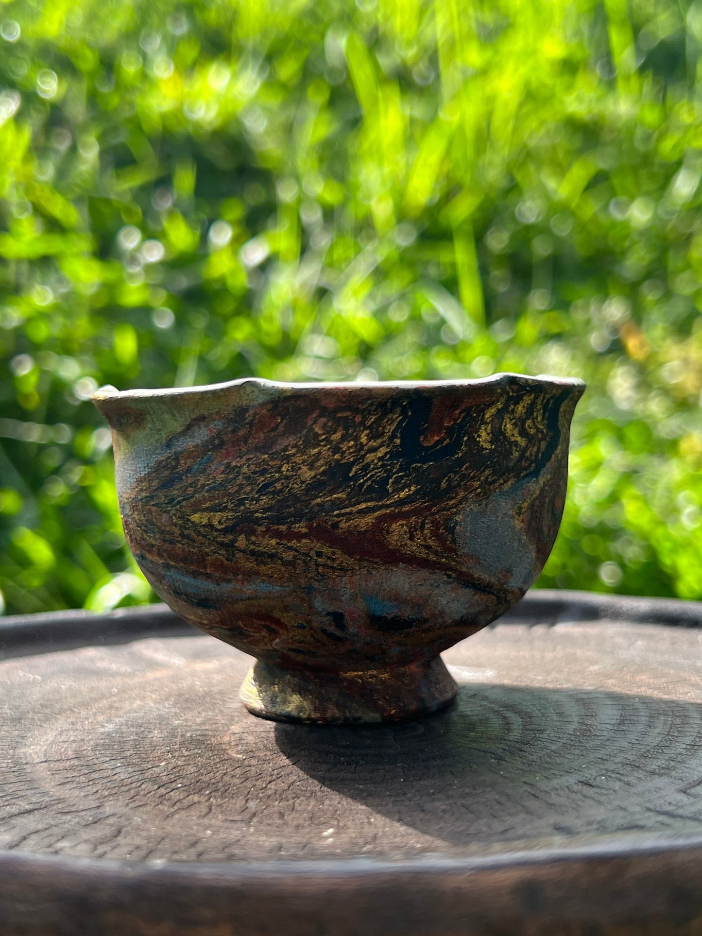 this is Chinese lacquer ware teacup. this is a pottery teacup