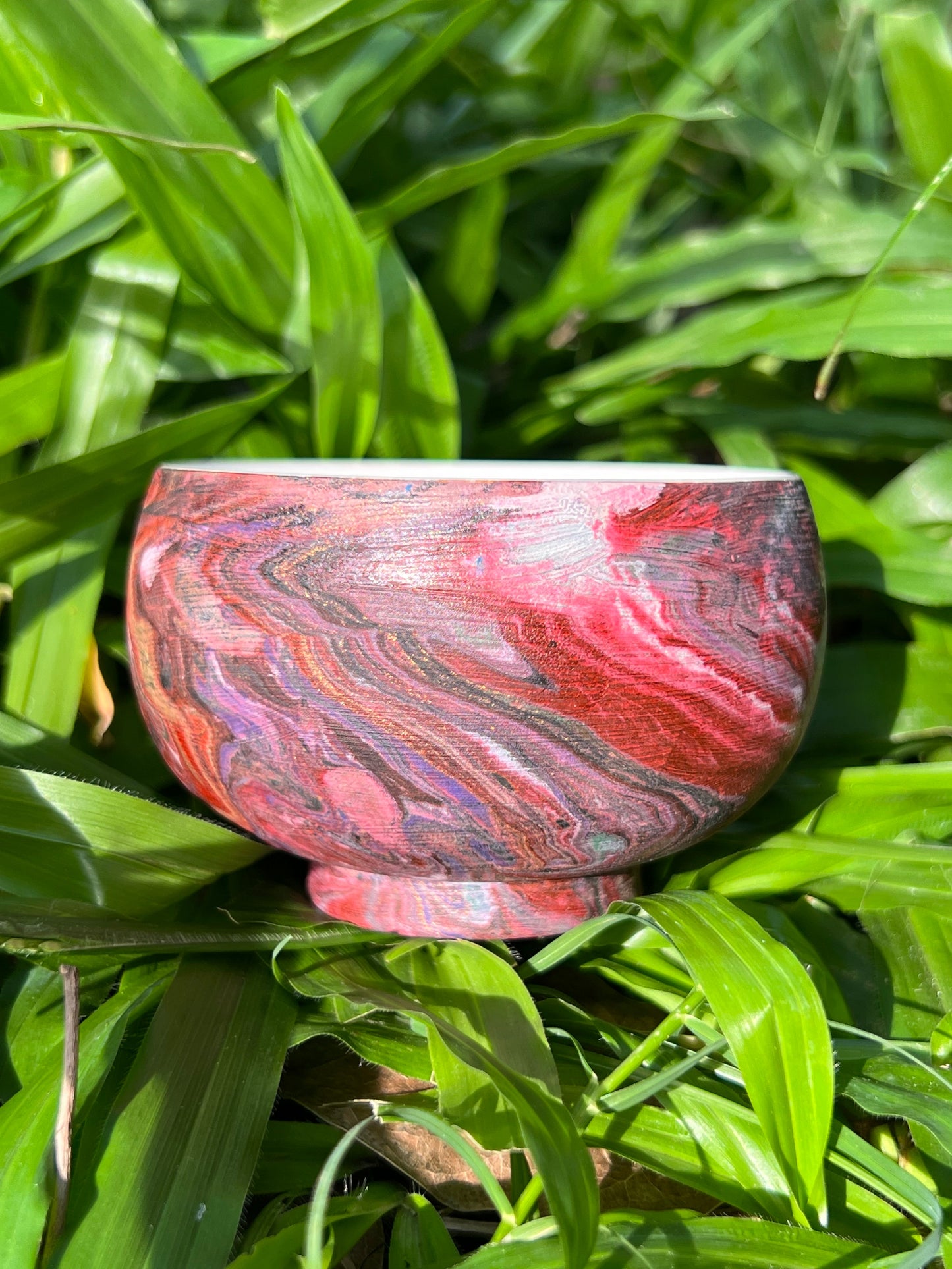 this is Chinese lacquer ware teacup. this is a pottery teacup