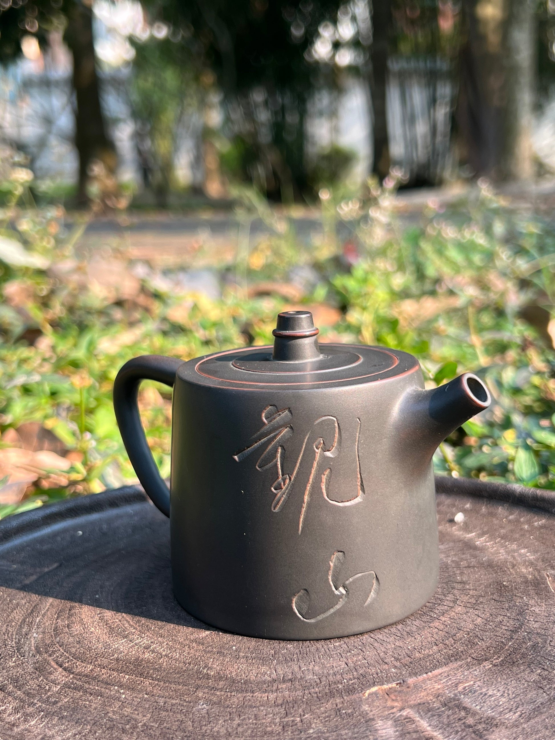 This is a Nixing clay teapot.this is a Chinese Nixing pottery teapot