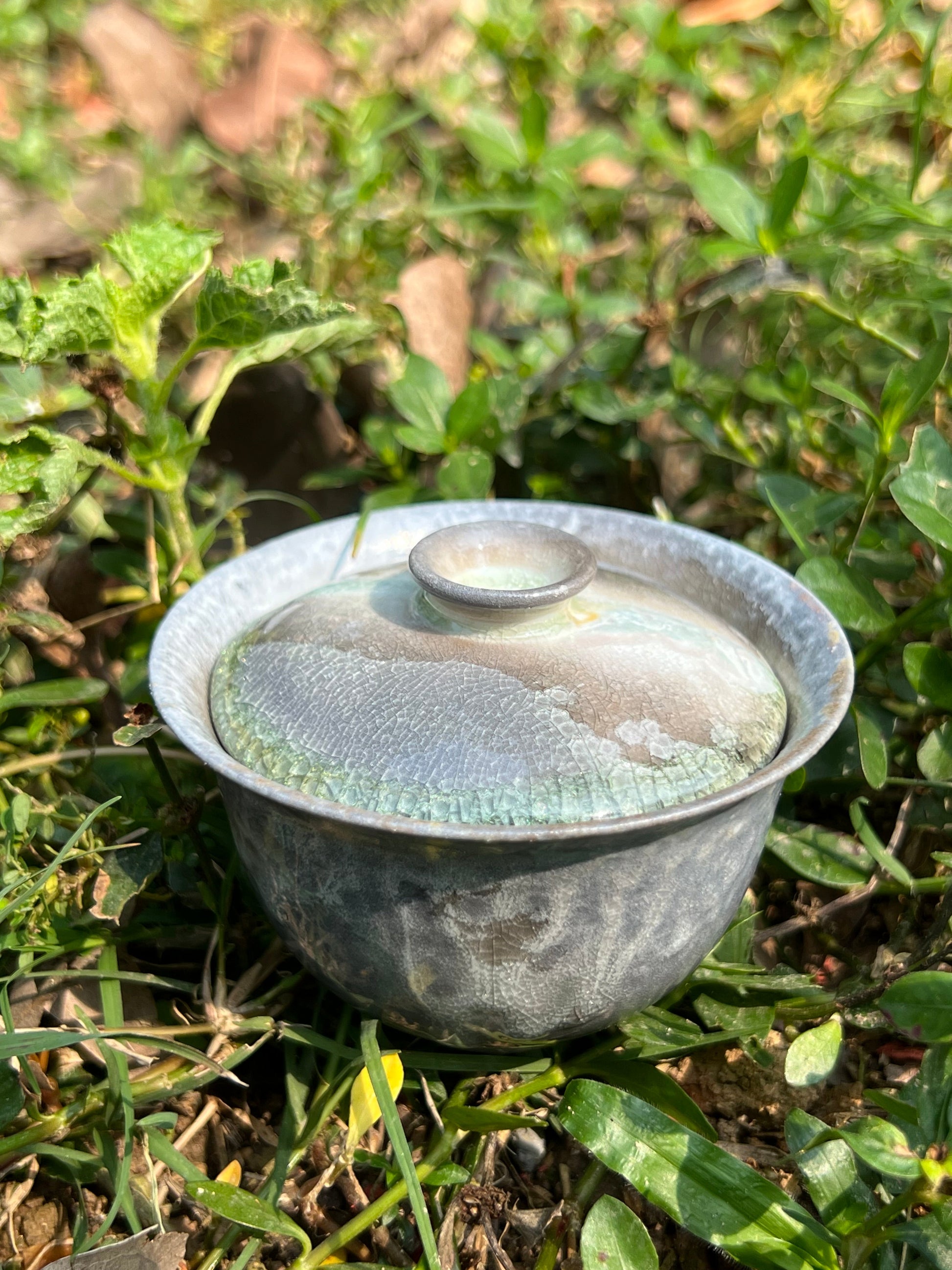 This is a woodfired pottery teapot gaiwan