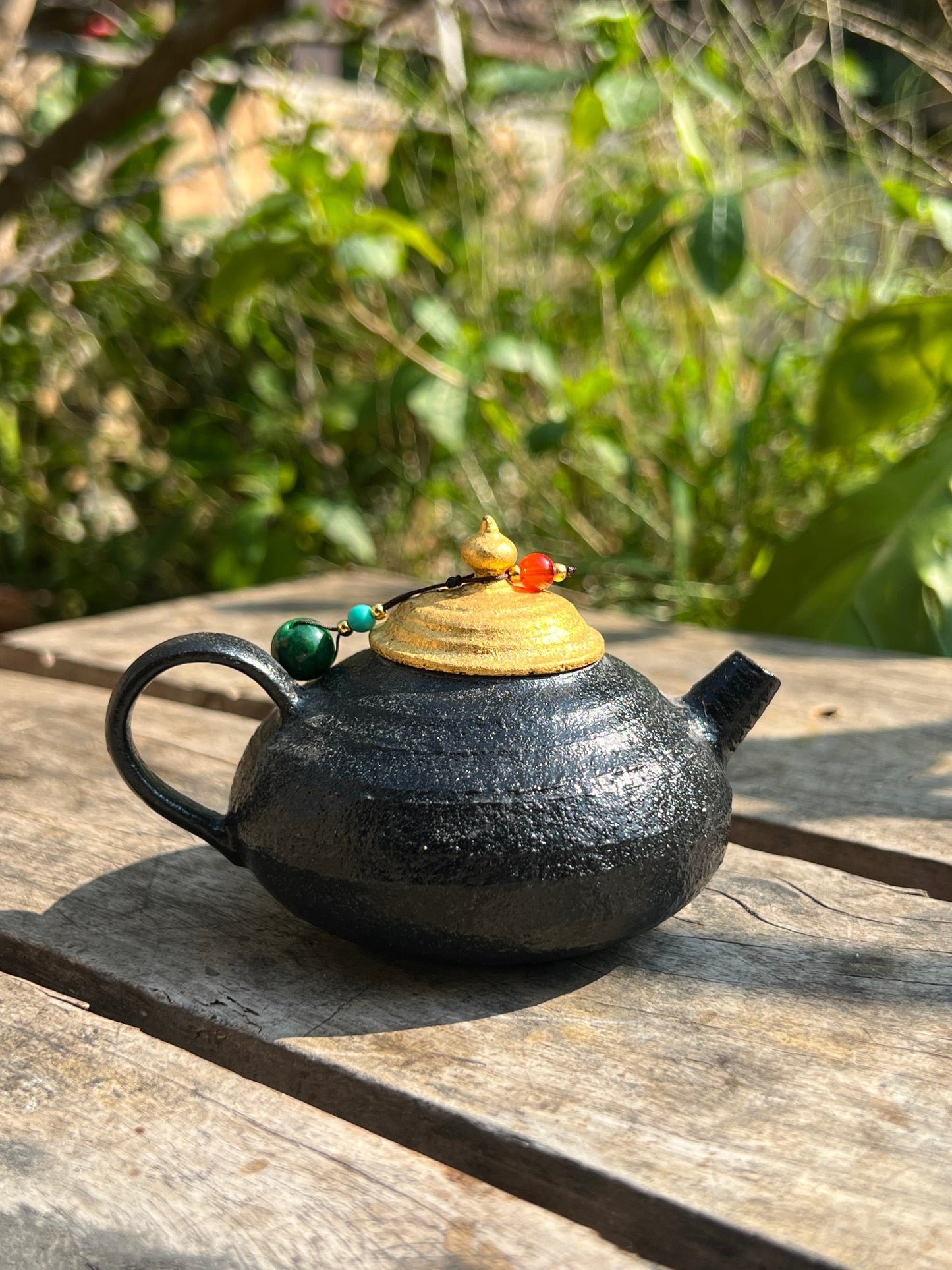 this is Chinese lacquer ware. this is a pottery teapot