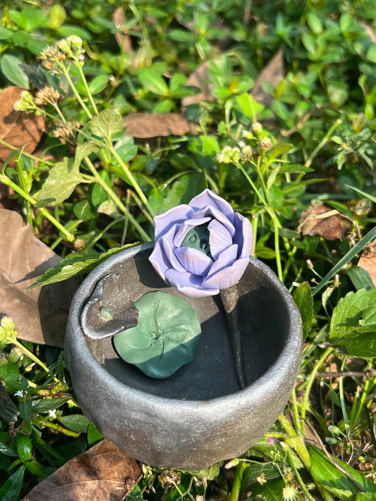 This is a woodfired tietai pottery flower teacup