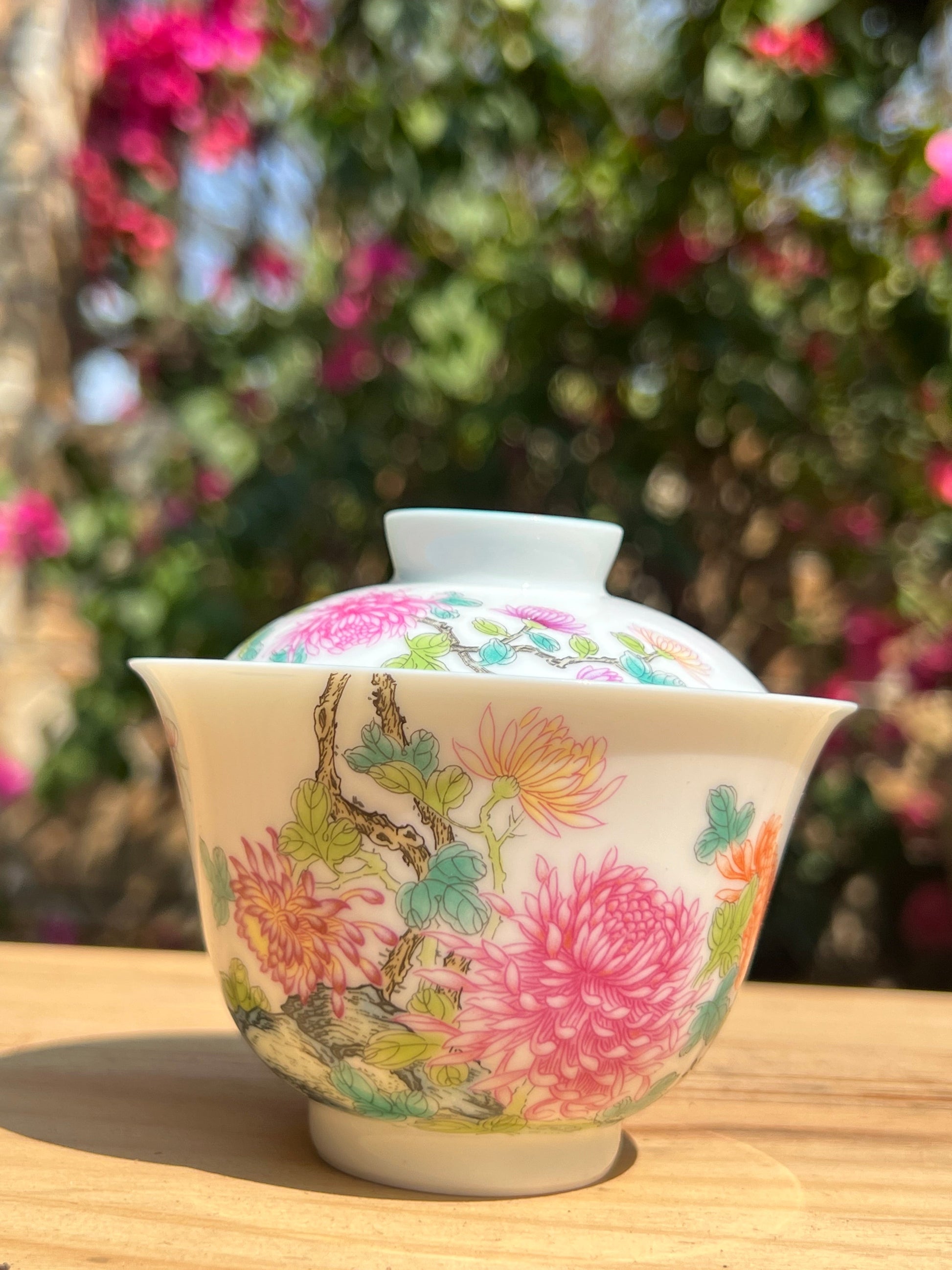 This is a Chinese Jingdezhen enamel chrysanthemum flower teapot gaiwan