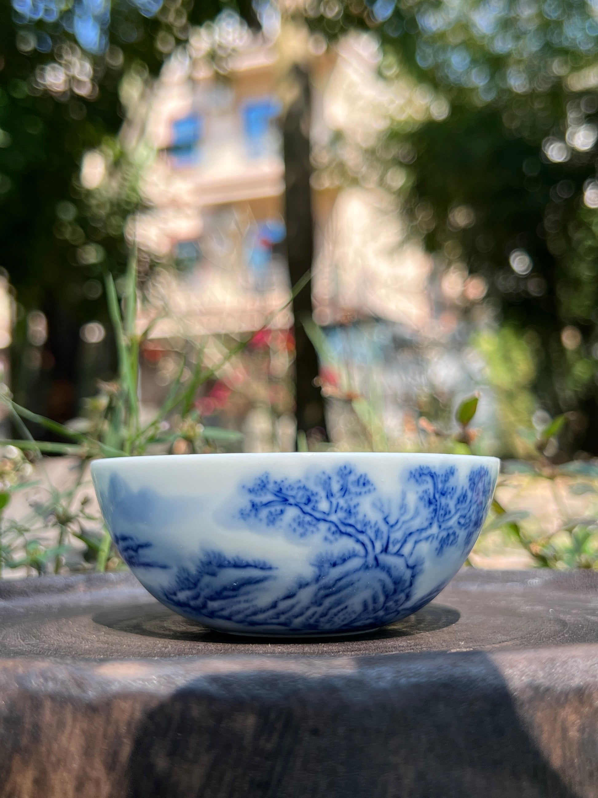 This is a Chinese Jingdezhen blue and white porcelain landscape teacup