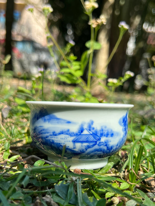This is a Chinese Jingdezhen blue and white porcelain landscape teacup