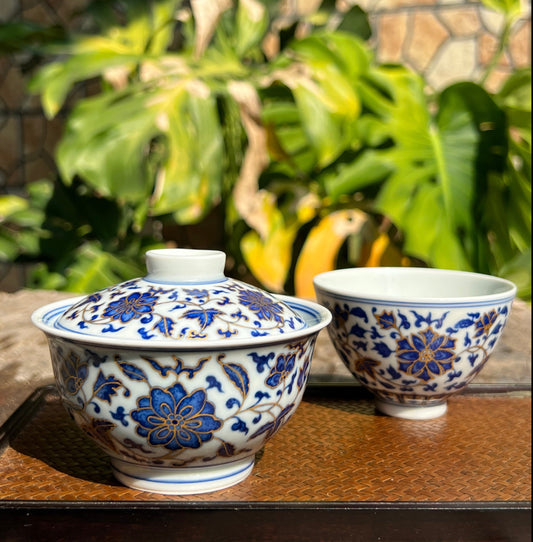 This is a Chinese Jingdezhen blue and white porcelain flower teapot gaiwan