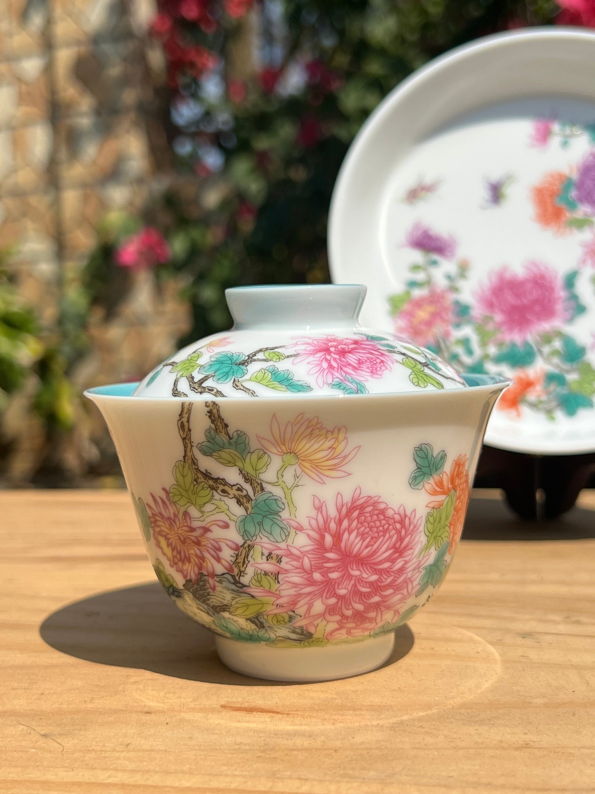 This is a Chinese Jingdezhen enamel chrysanthemum flower teapot gaiwan