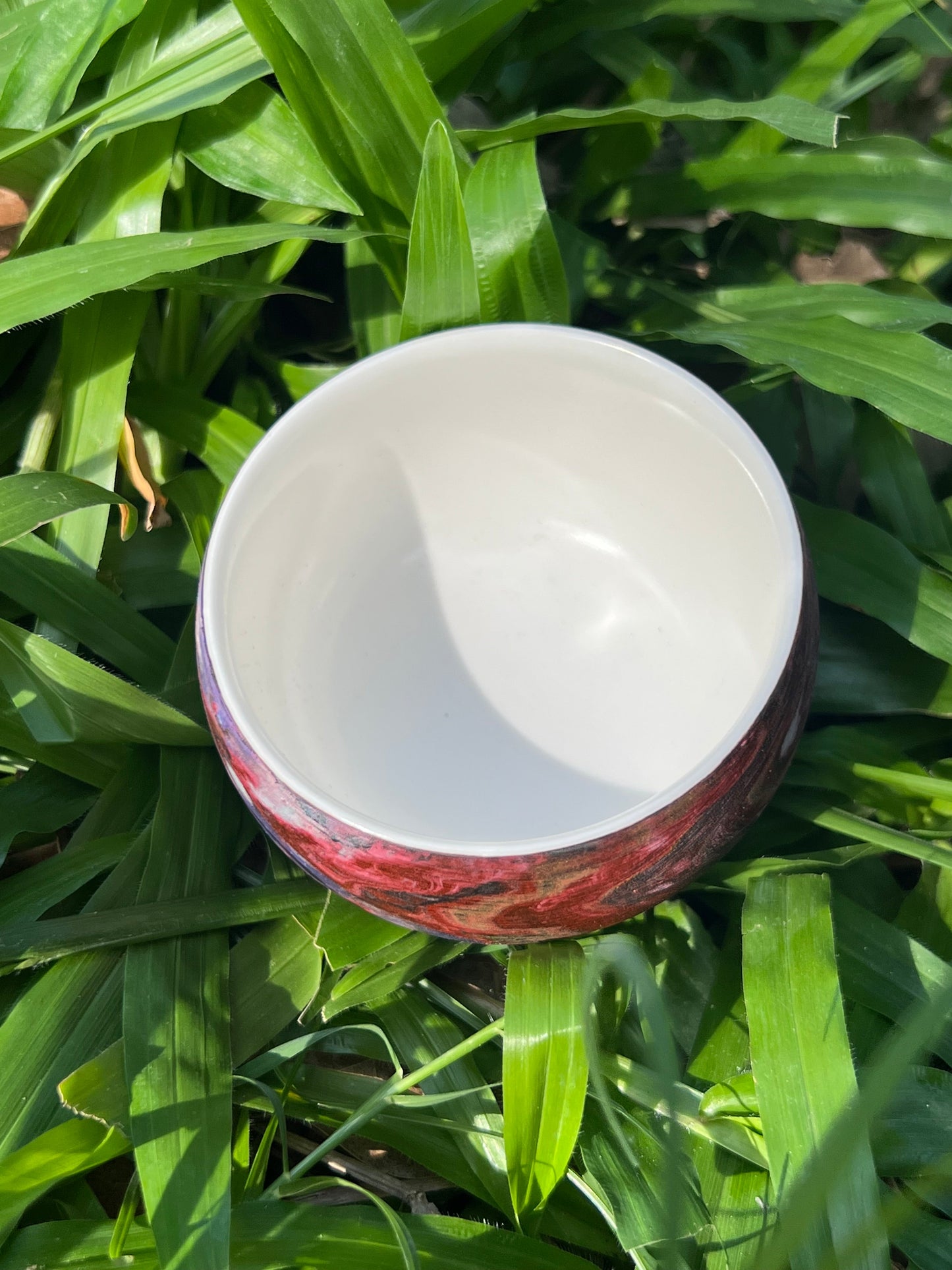 this is Chinese lacquer ware teacup. this is a pottery teacup