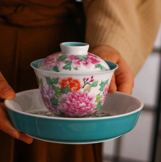 This is a Chinese Jingdezhen enamel flower teapot gaiwan