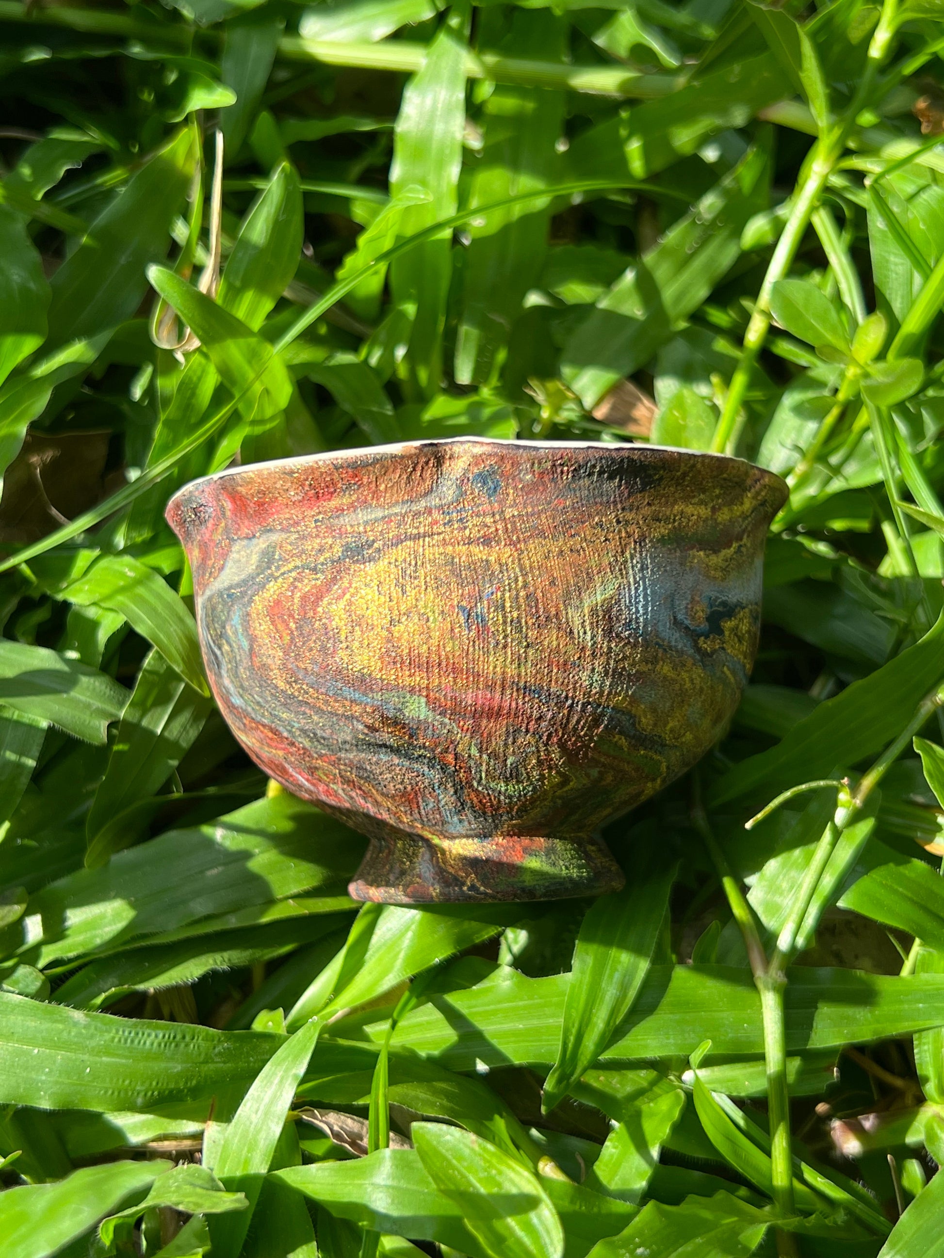 this is Chinese lacquer ware teacup. this is a pottery teacup