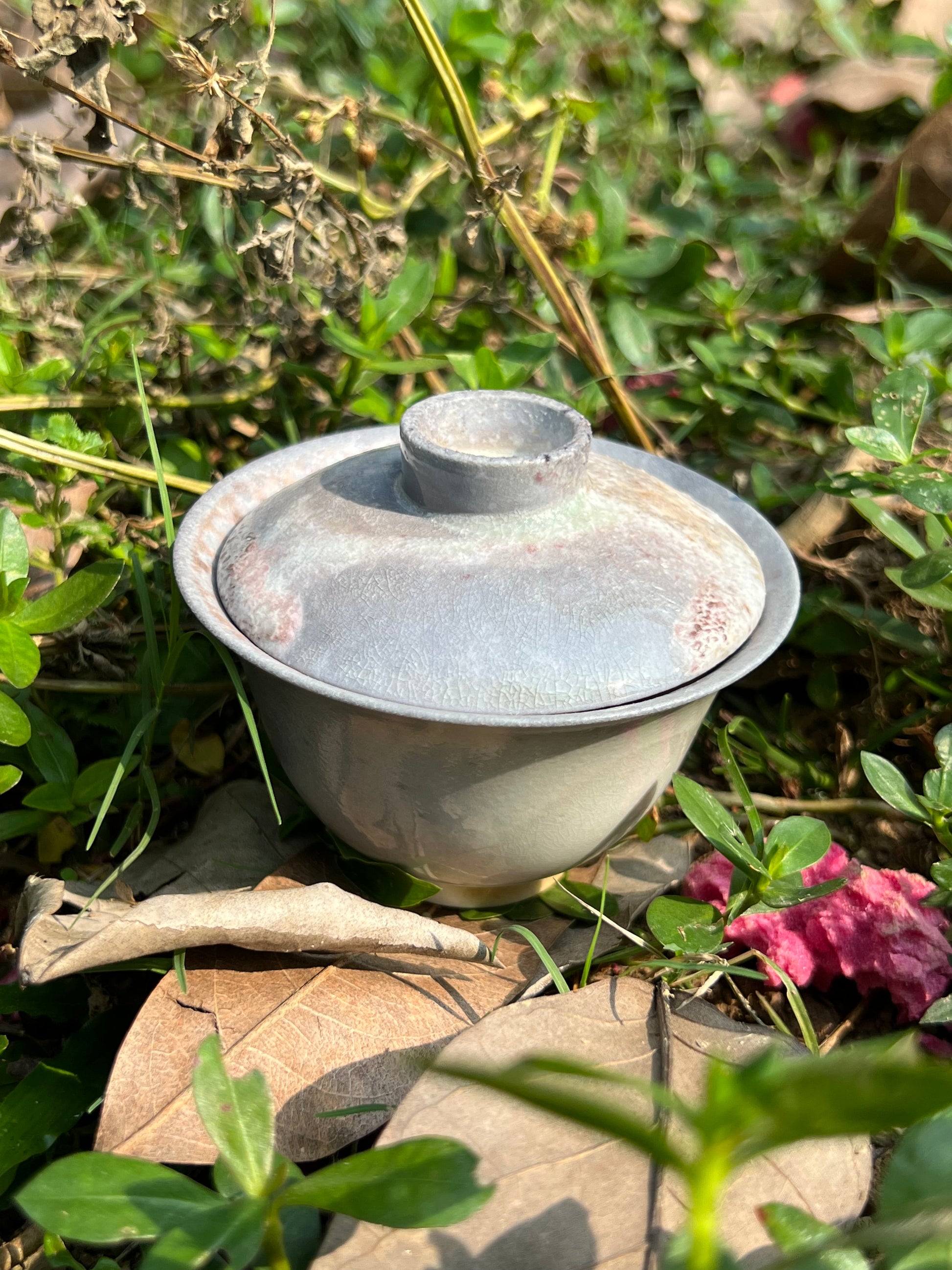 This is a woodfired pottery teapot gaiwan