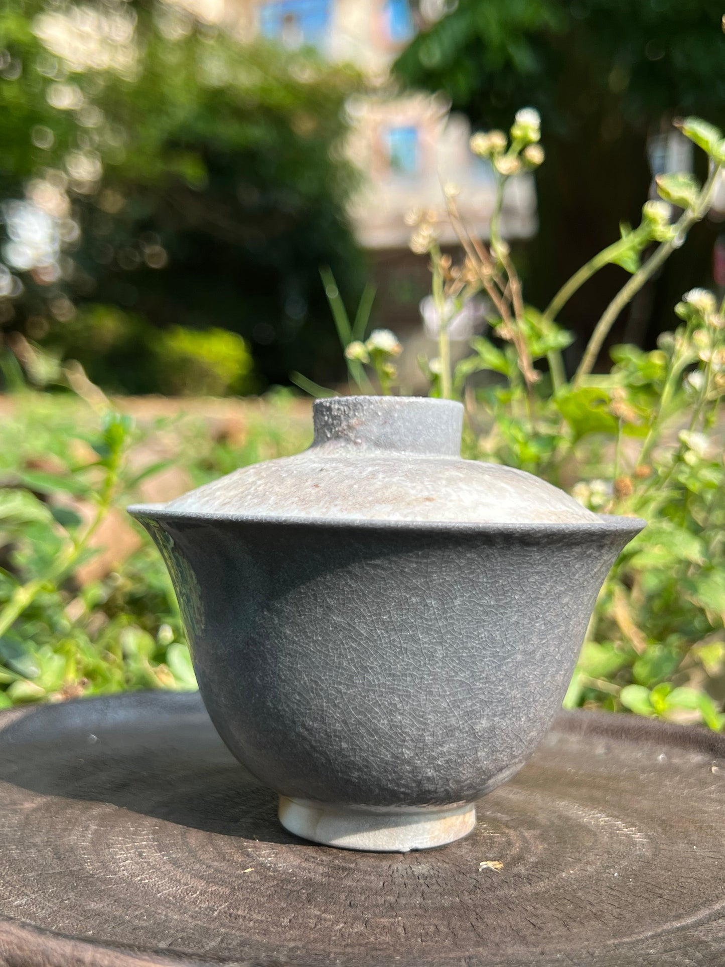 This is a woodfired pottery teapot gaiwan