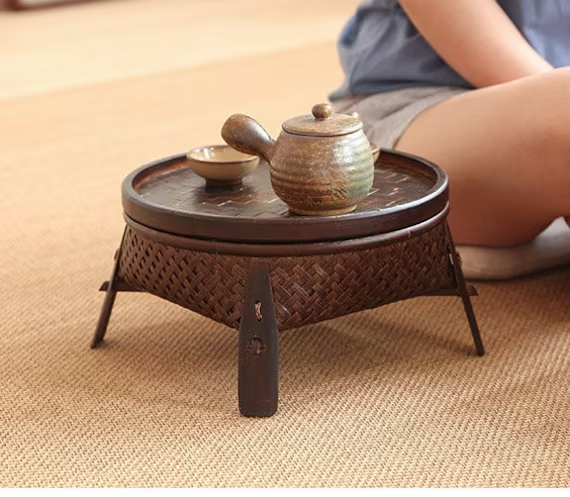 This is a bamboo weaving storage tea table