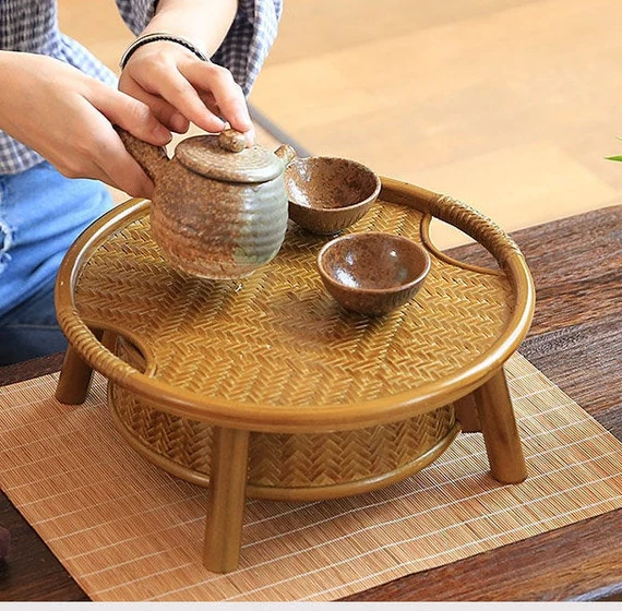 This is a bamboo weaving storage tea box.this is a yellow tea table