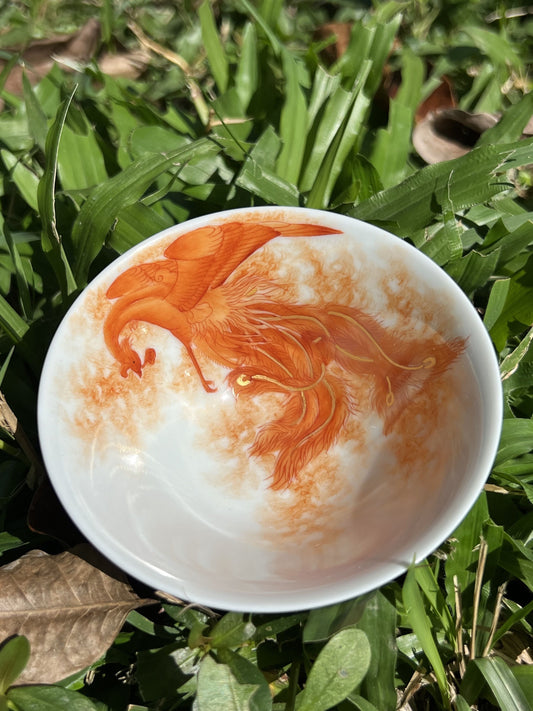 this is a Chinese Jingdezhen alum red phoenix teacup.this is a ceramic teacup