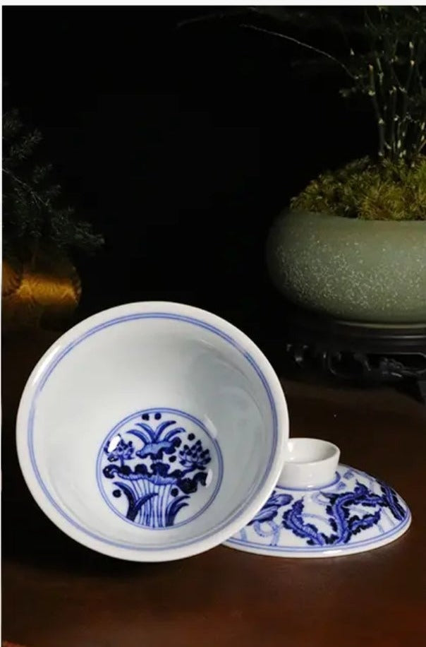 This is a Chinese Jingdezhen blue and white porcelain flower teapot