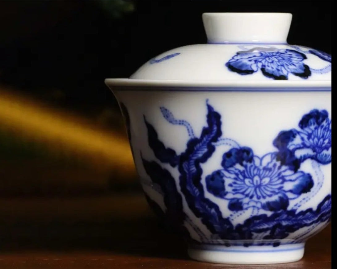 This is a Chinese Jingdezhen blue and white porcelain flower teapot