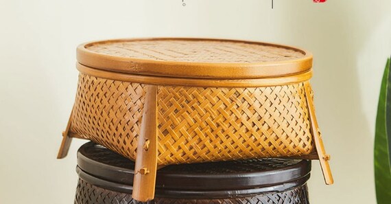 This is a bamboo weaving storage tea box.this is a yellow tea table