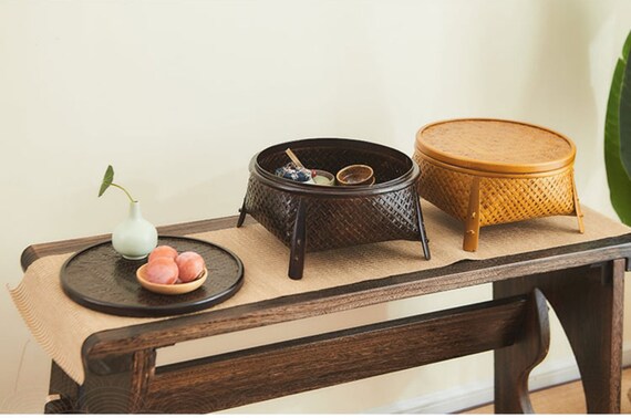 This is a bamboo weaving storage tea box.this is a yellow tea table