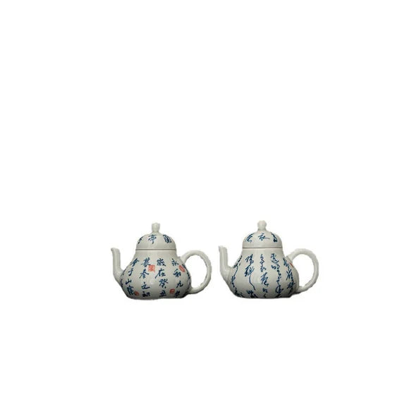 This is a white ceramic teapot