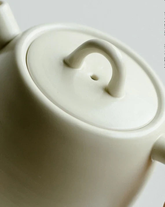 This is a ceramic teapot