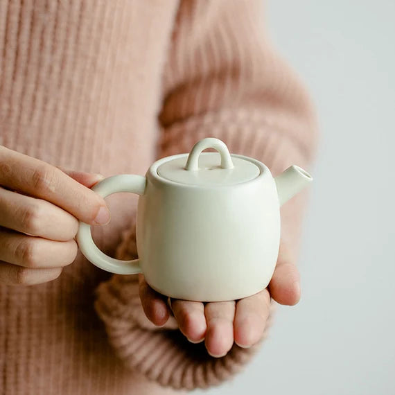 This is a ceramic teapot