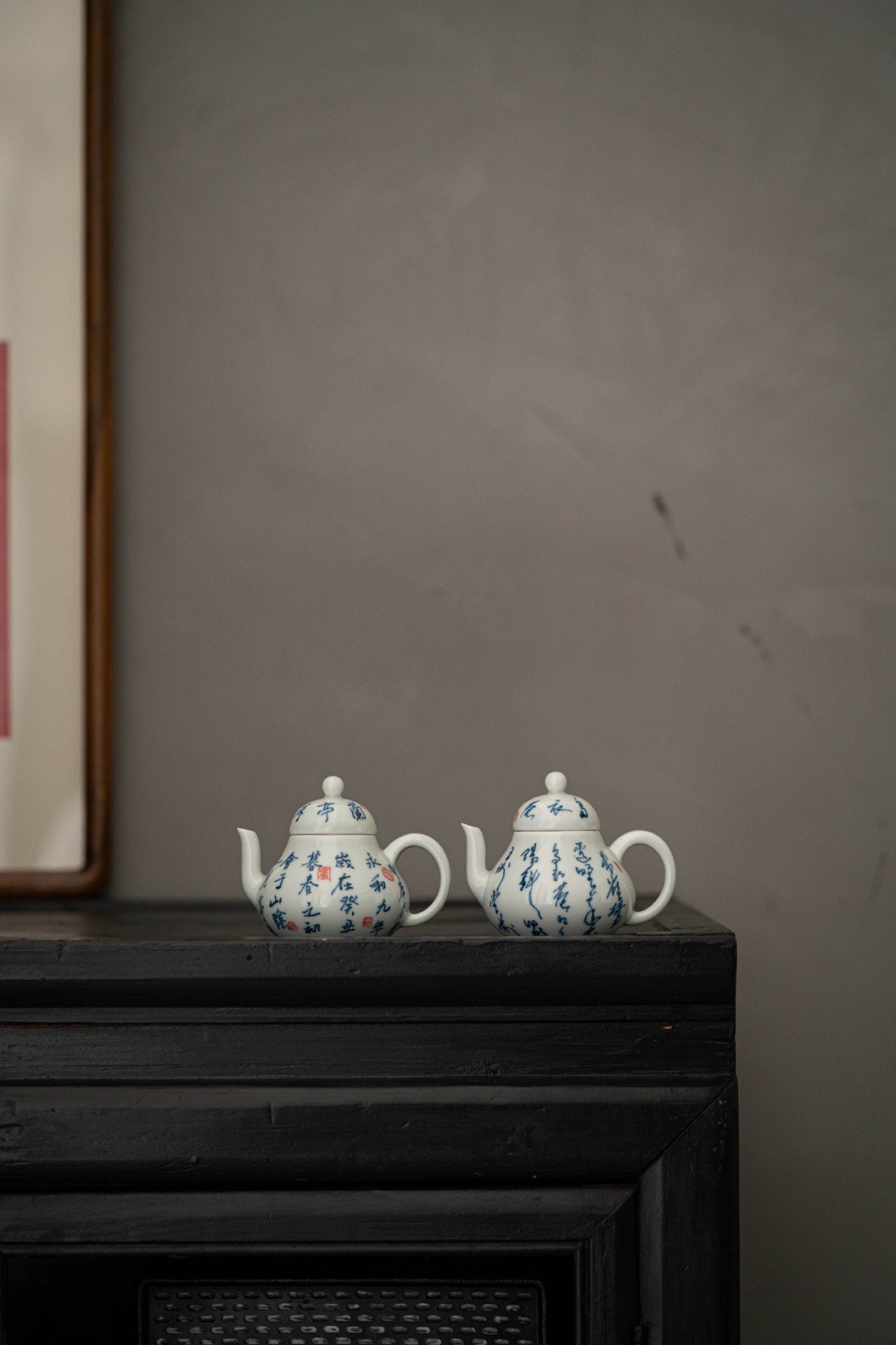 This is a white ceramic teapot