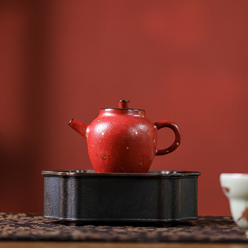 this is a ceramic teapot