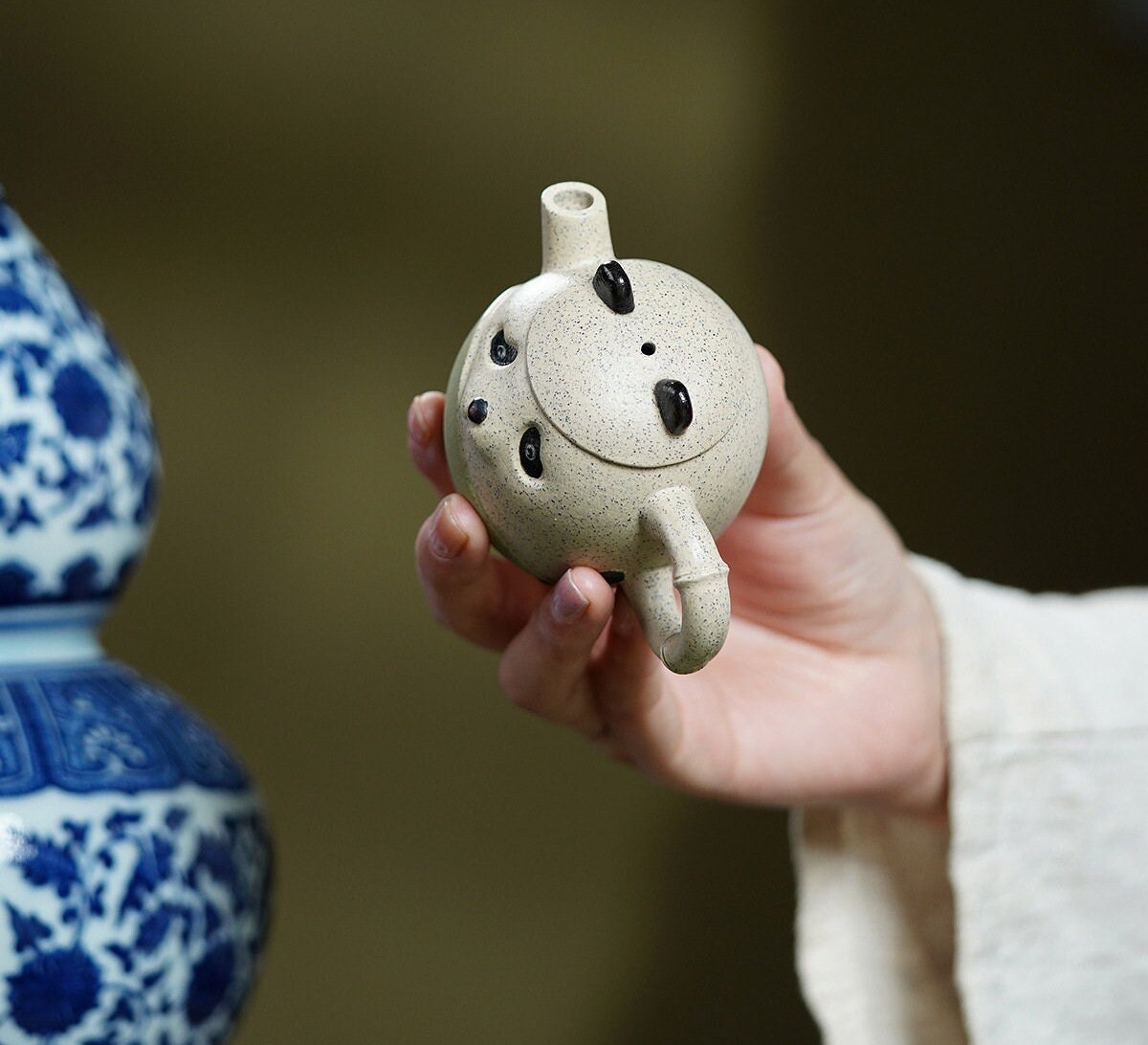 This is a pottery teapot