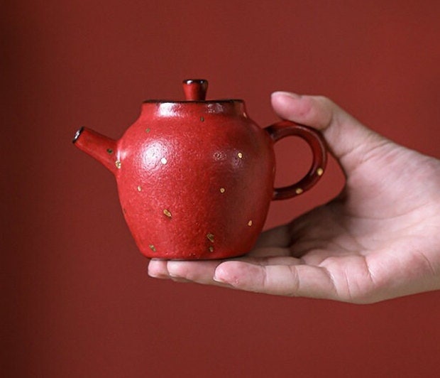 this is a ceramic teapot